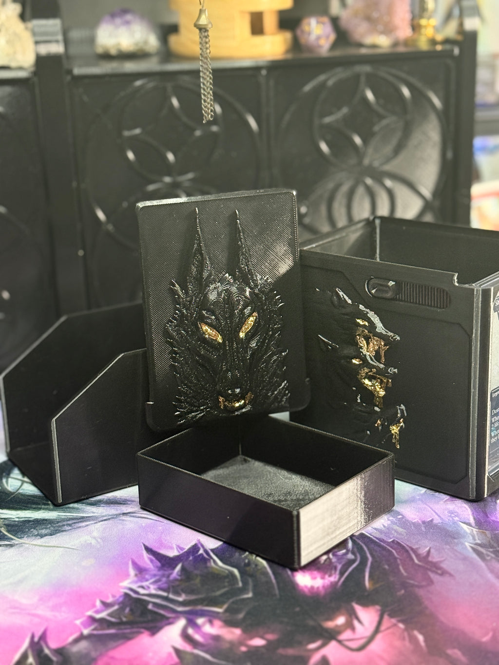 Black and gold wolf relief box with separate dice container