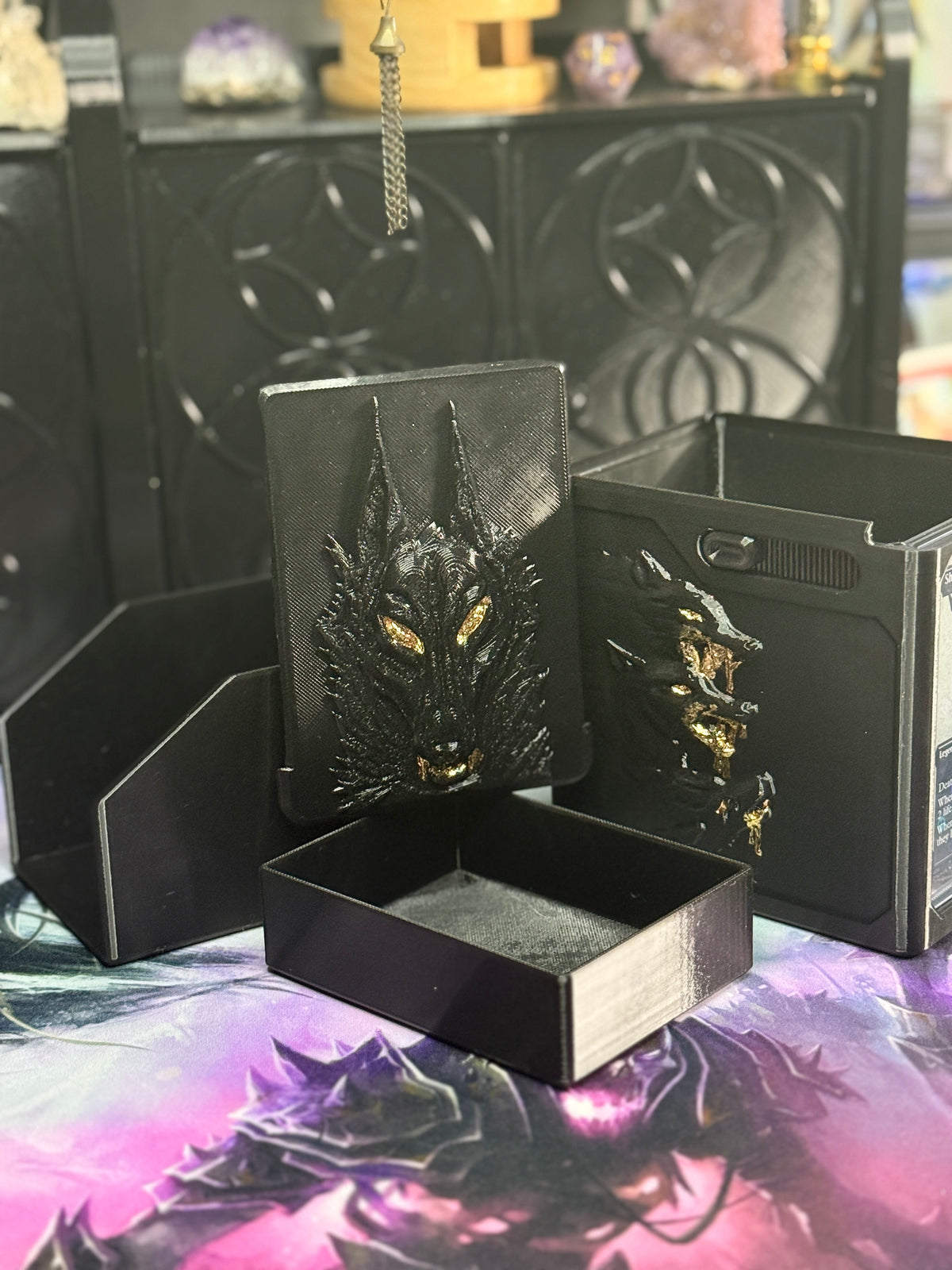 Black and gold wolf relief box with separate dice container